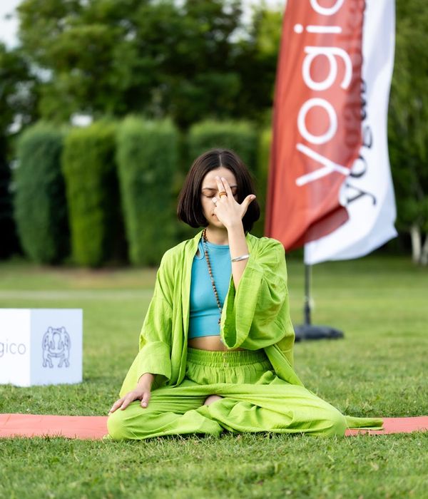Woman in a calm yoga pose symbolizing inner harmony and balance.